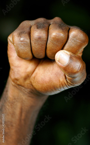 clenched fist of afro man