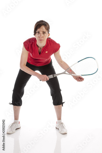 Erwachsene Frau spielt Squash © runzelkorn
