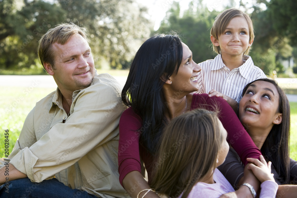 Indian mother surrounded by beautiful mixed race family Indian mother surrounded by beautiful mixed race family
