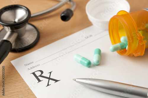Prescription with Pills and stethoscope photo