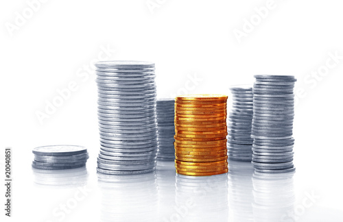 Coins isolated on white background, image in blue tone photo