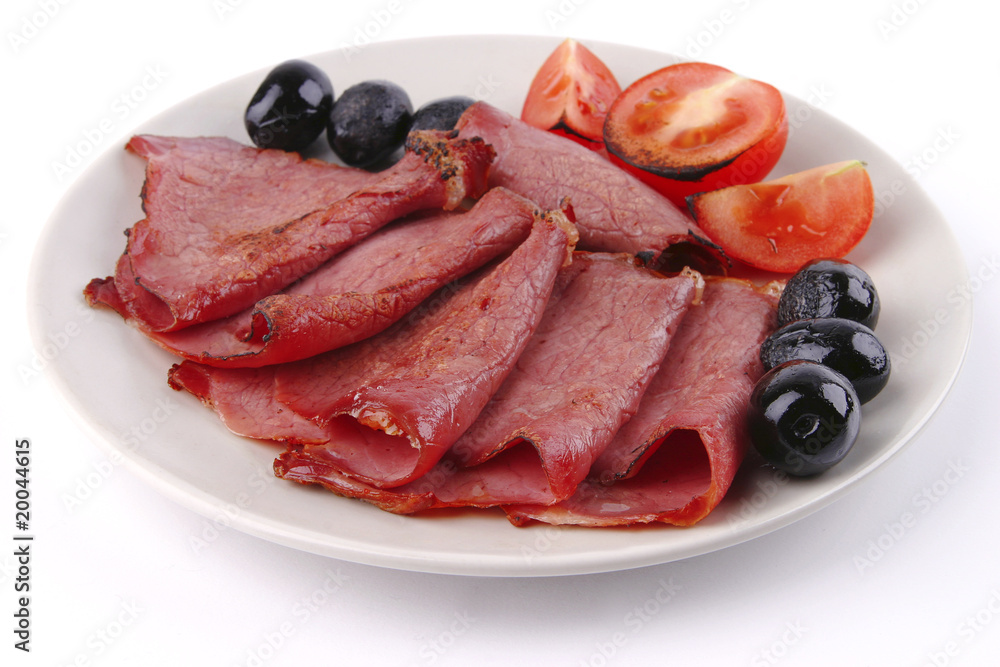 sliced served sausage with raw tomato sliced served sausage with raw tomato