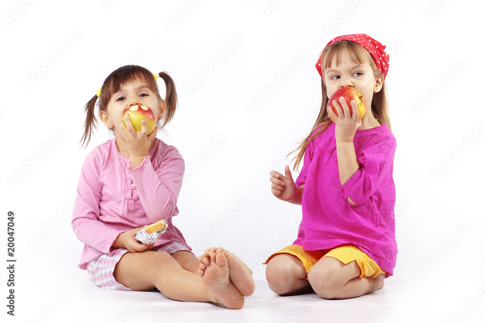 Kids eating apples Kids eating apples
