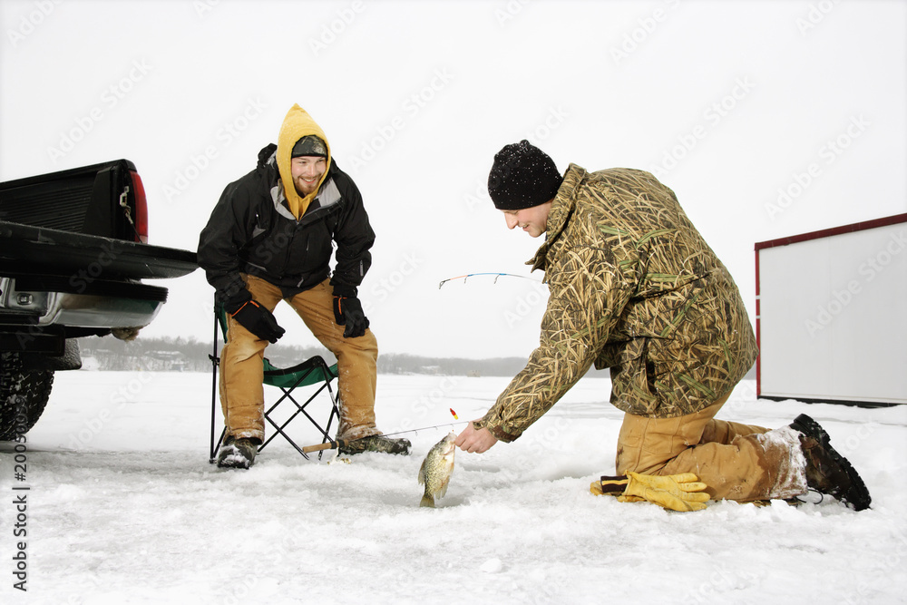 Naklejka premium Men Ice Fishing