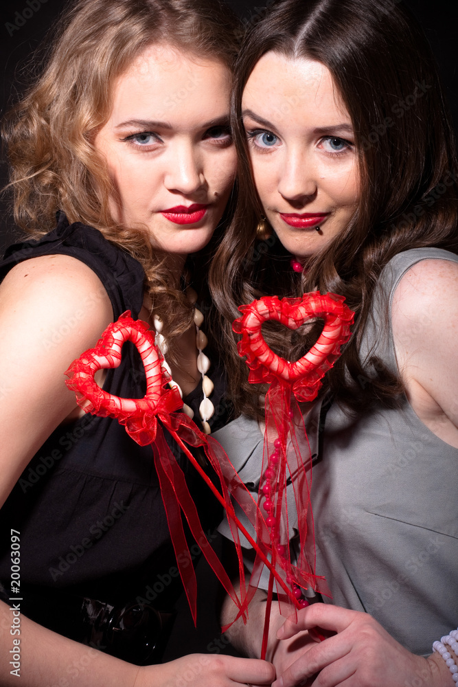 Two beautiful girls celebrate Valentine's Day Two beautiful girls celebrate Valentine's Day