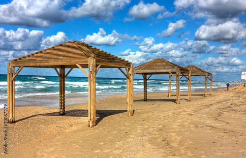 Sea shore and wooden sun shelters     Netanya  Israel