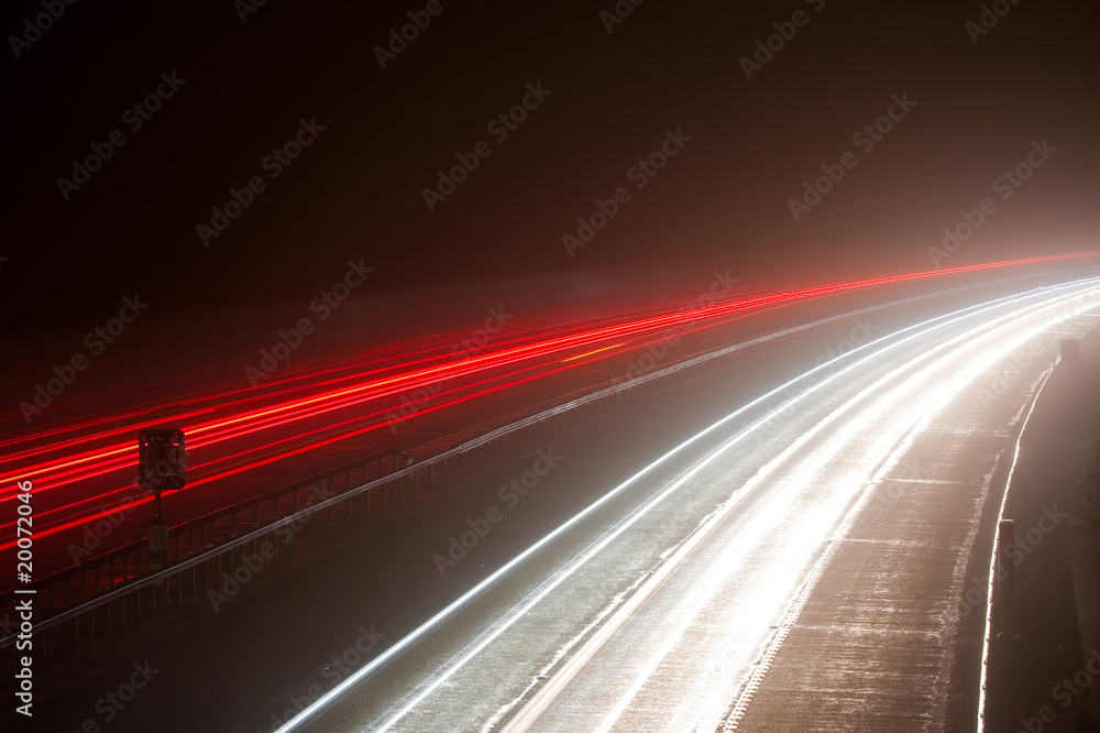 Light trails on a foggy motorway Light trails on a foggy motorway