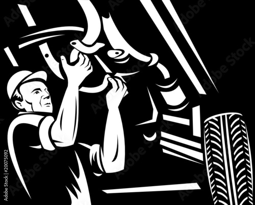 Car mechanic repairing working on auto vehicle
