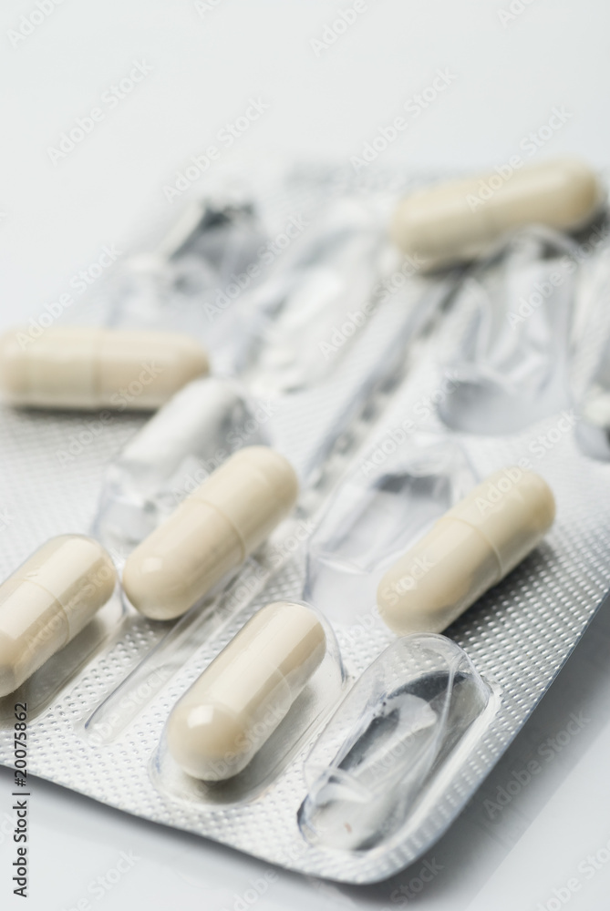 Package of medicine capsules on white background Package of medicine capsules on white background
