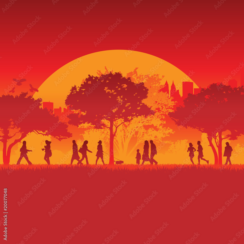 Silhouetted runners in front of city background and sun