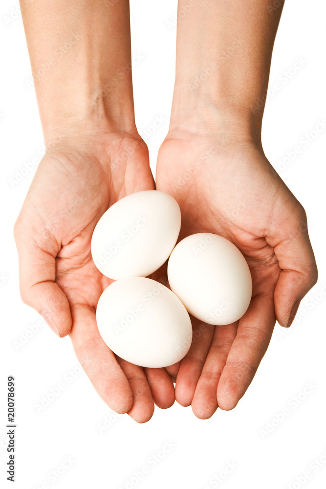 Eggs in hands Eggs in hands