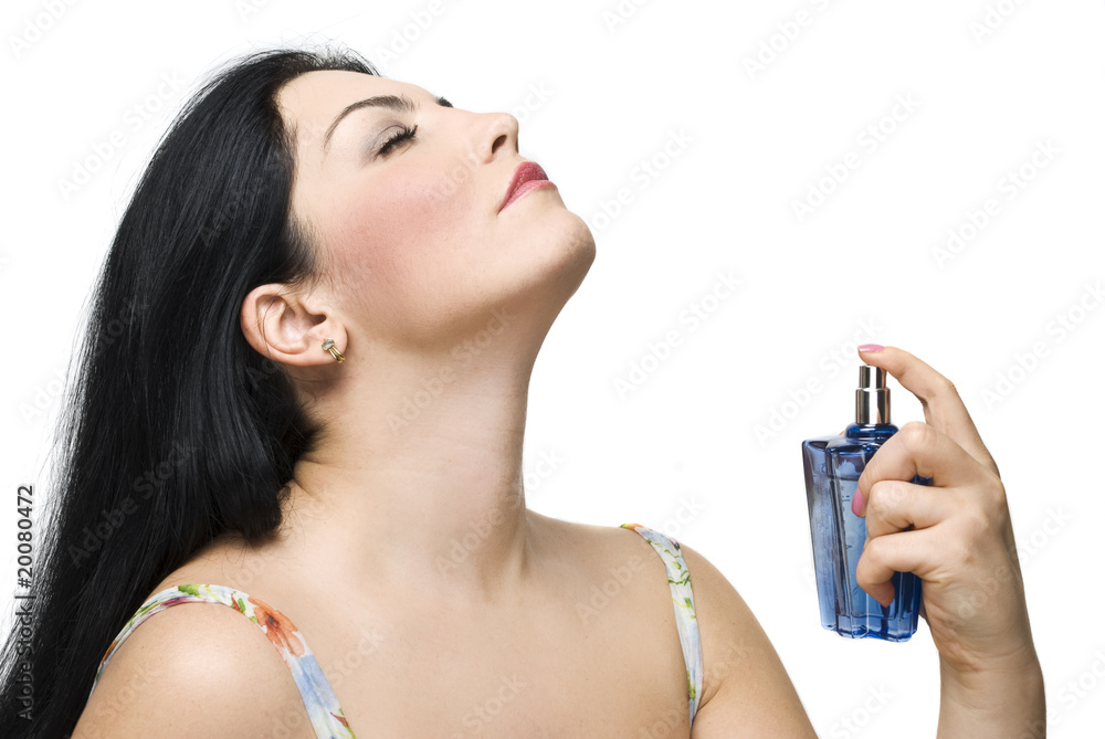 Woman enjoy the fragrance of her perfume Woman enjoy the fragrance of her perfume