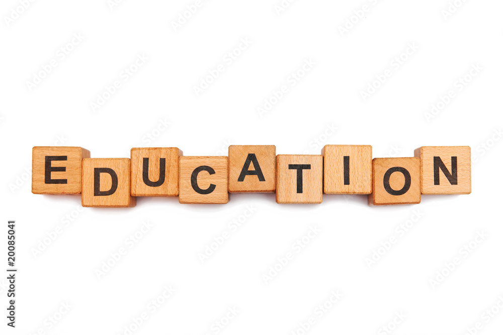 Education word made of educational wooden toy blocks isolated on white background Education word made of educational wooden toy blocks isolated on white background