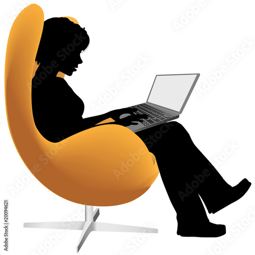 Woman sits in chair to work shop on laptop computer