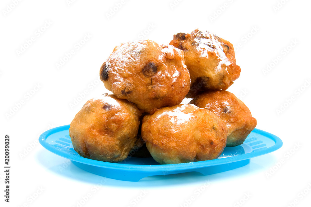 blue plate with Dutch donut also known as oliebollen blue plate with Dutch donut also known as oliebollen