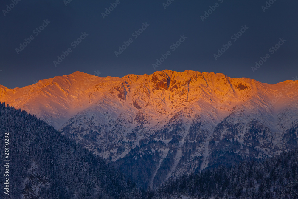 Fototapeta premium Beautiful sunrise in the mountains in winter