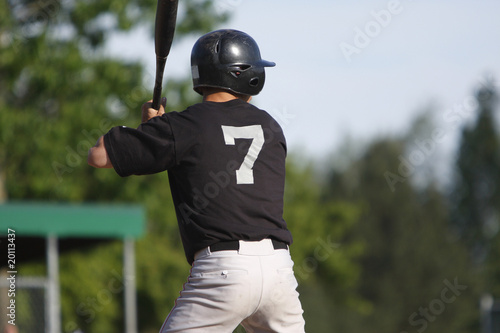 Photography A batter about to hit a pitch during a baseball game