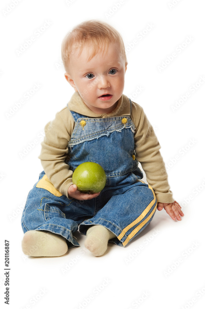 Fototapeta premium little boy and green apple.