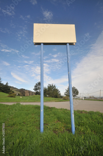 Blank sign held up with two long poles