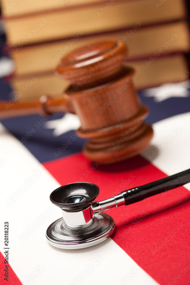 Gavel, Stethoscope and Books on Flag Gavel, Stethoscope and Books on Flag