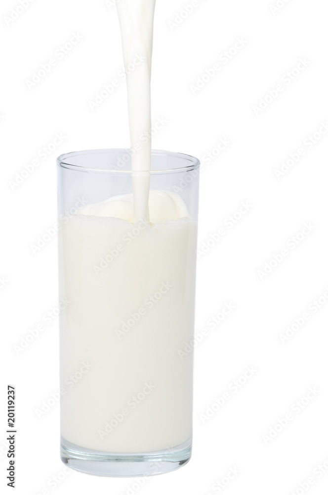 Stream of milk falling in glass Stream of milk falling in glass