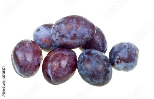 Fresh natural plums isolated on white