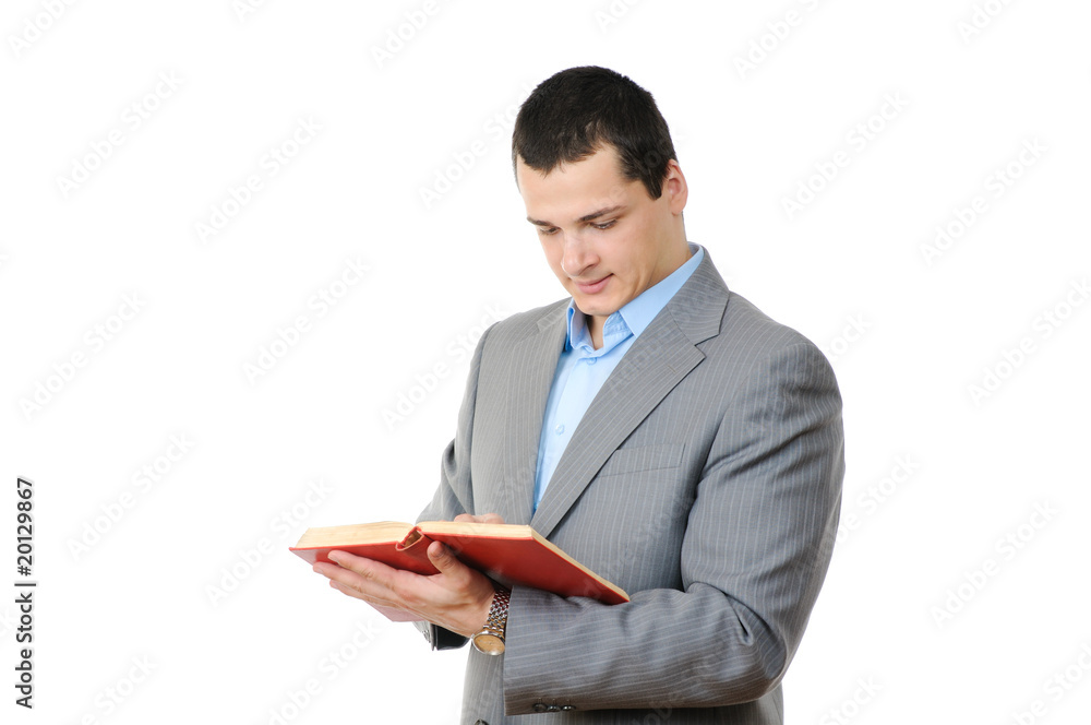 Young man holding book isolated on white background Young man holding book isolated on white background