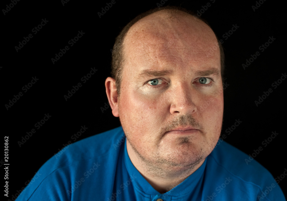 closeup portrait capture of a male on black background closeup portrait capture of a male on black background
