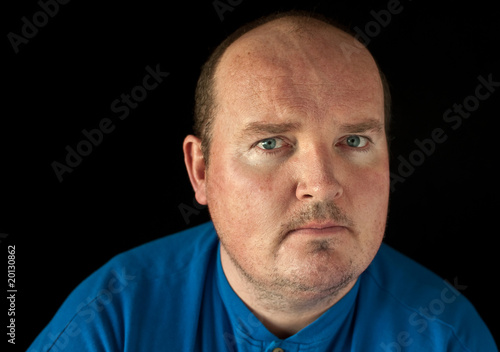 closeup portrait capture of a male on black background photo