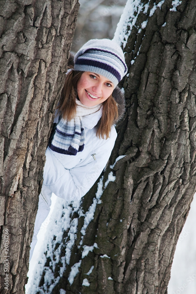 Beautiful young woman in winter forest Beautiful young woman in winter forest