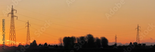 electric tower silhouette for during sunset