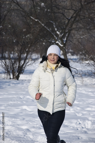 Runner woman in snow