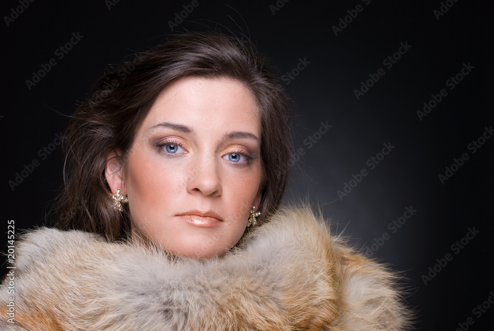 Close up portrait of young fashion woman in fur Close up portrait of young fashion woman in fur