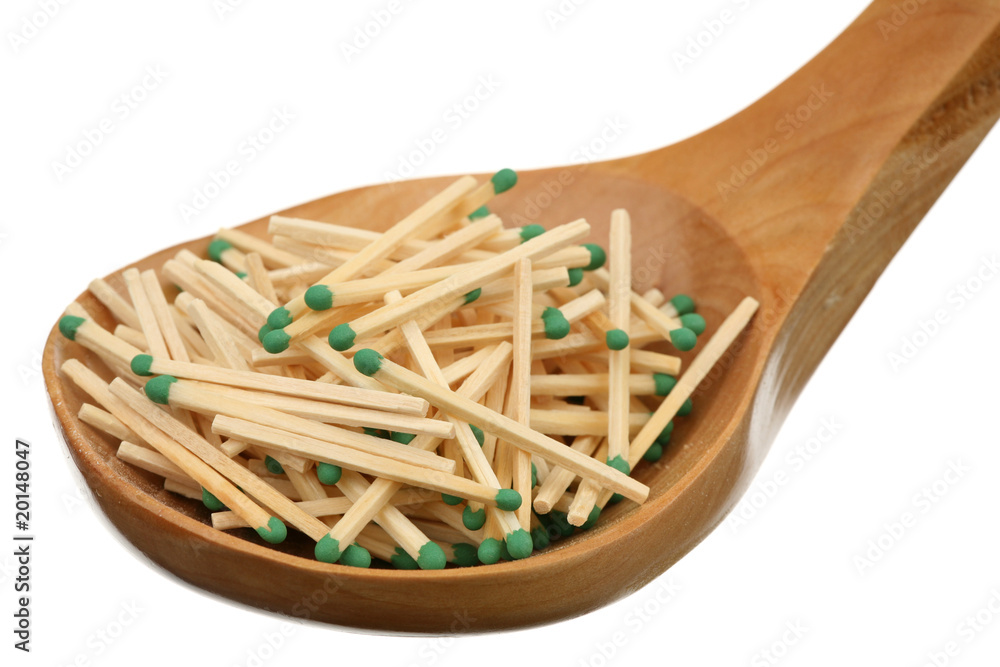 Matches in a wooden spoon