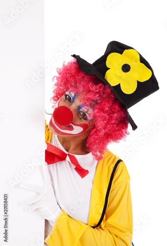funny clown holding a banner