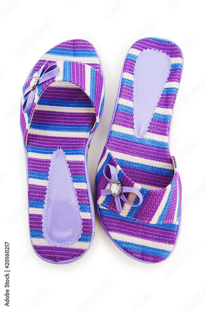 Elegant slippers isolated on the white background Elegant slippers isolated on the white background