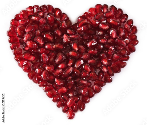 eart shaped pomegranate seeds, high key