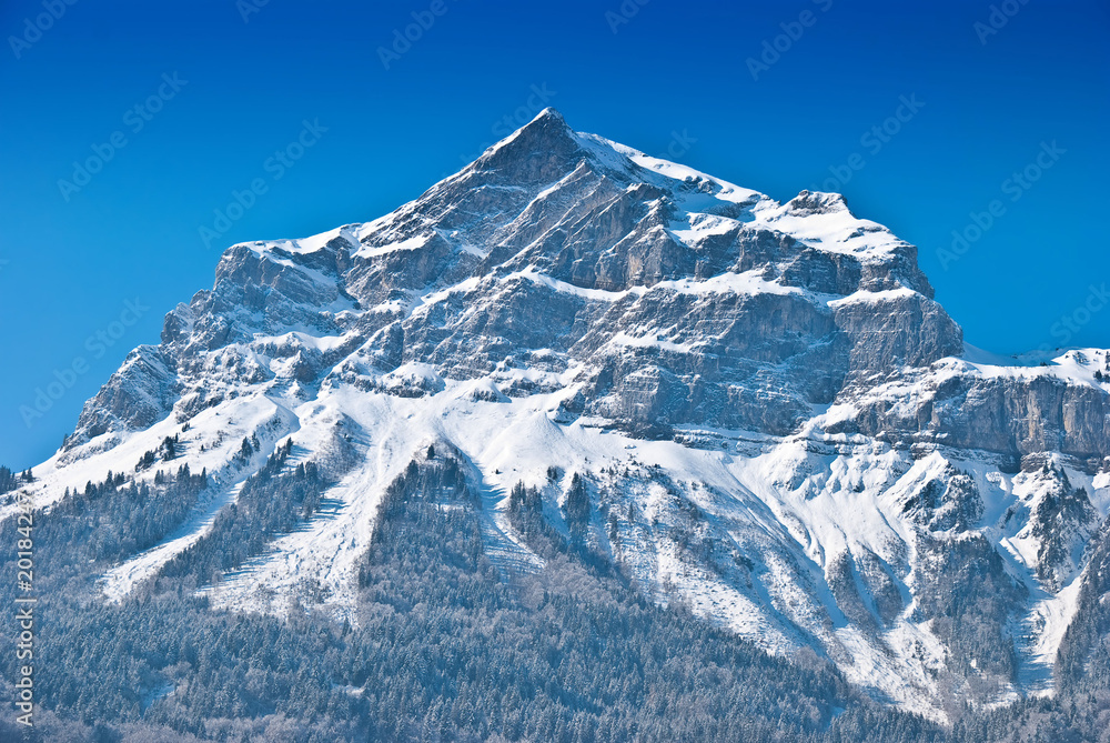 Snowbound mountain peak. French Alps near Chamonix.