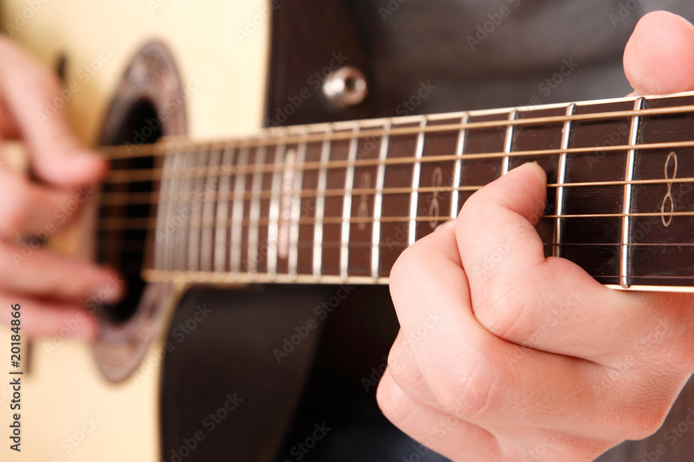 Close up of guitarist hand playing guitar Close up of guitarist hand playing guitar