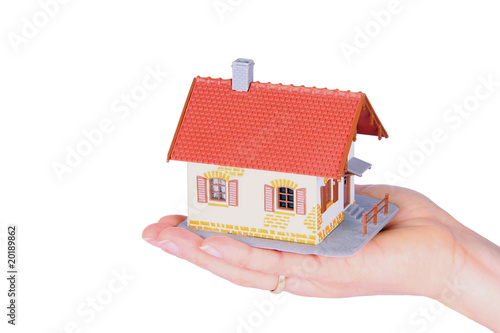 One family house in a hand