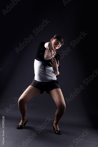 woman dancer against black background