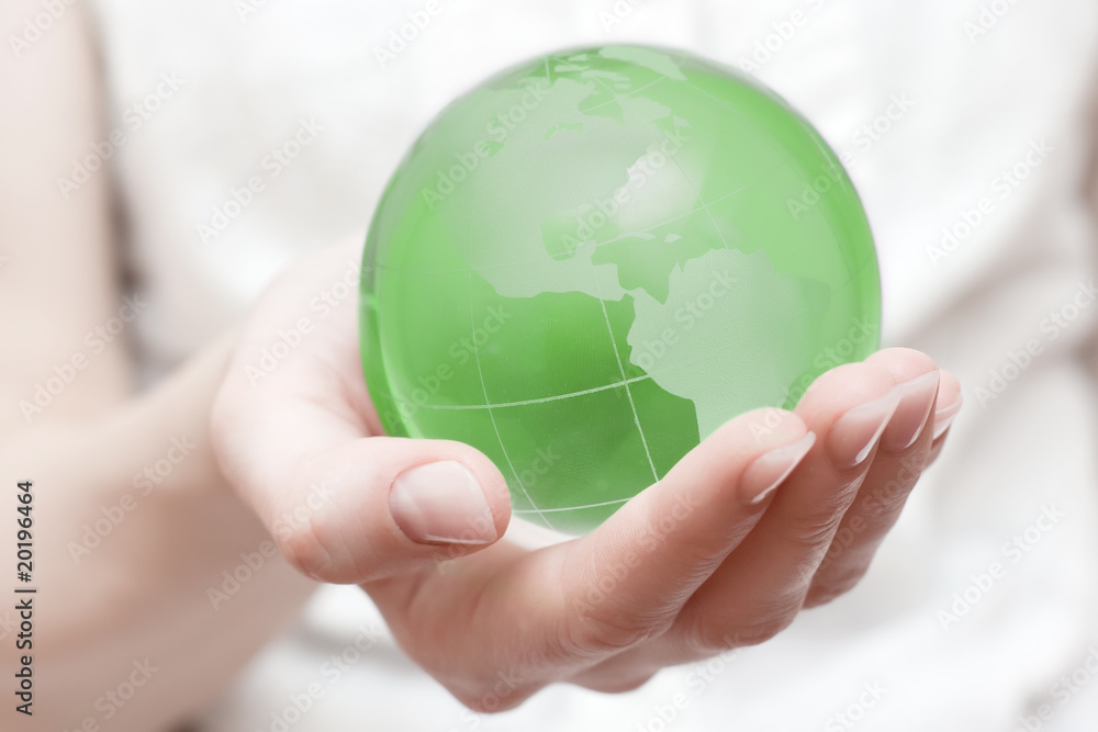 earth globe in hand