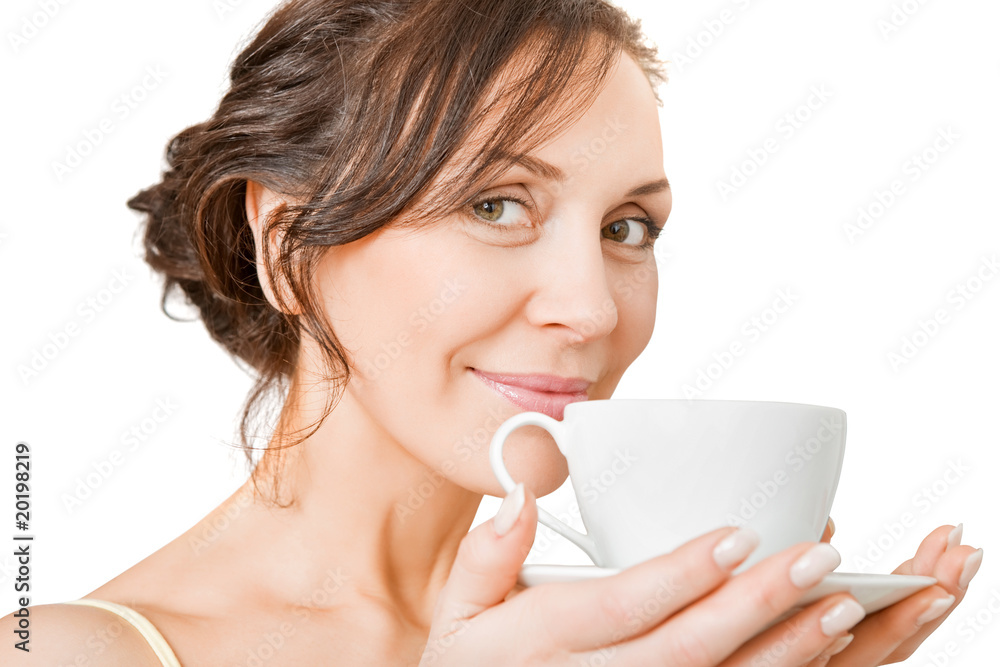 young woman enjoying a cup of tea young woman enjoying a cup of tea