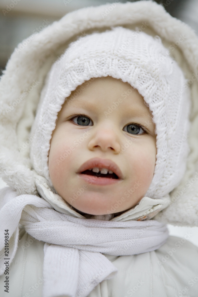 blond little cute girl in winter clothes blond little cute girl in winter clothes