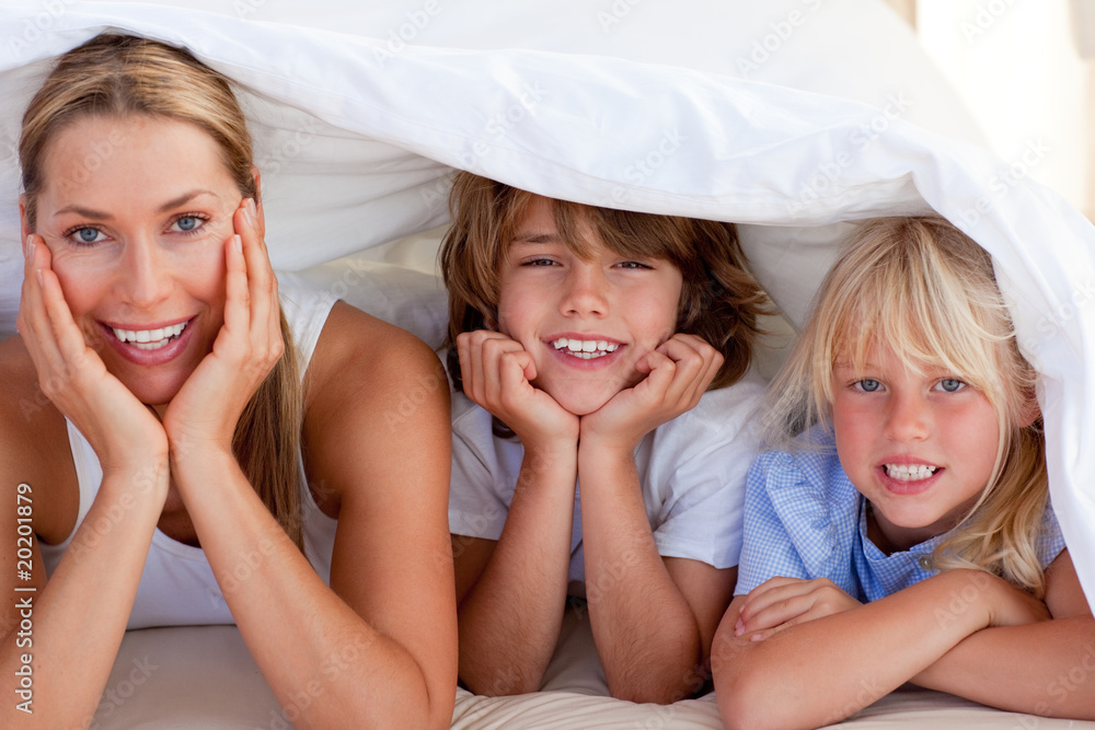 Attractive mother having fun with her children Attractive mother having fun with her children