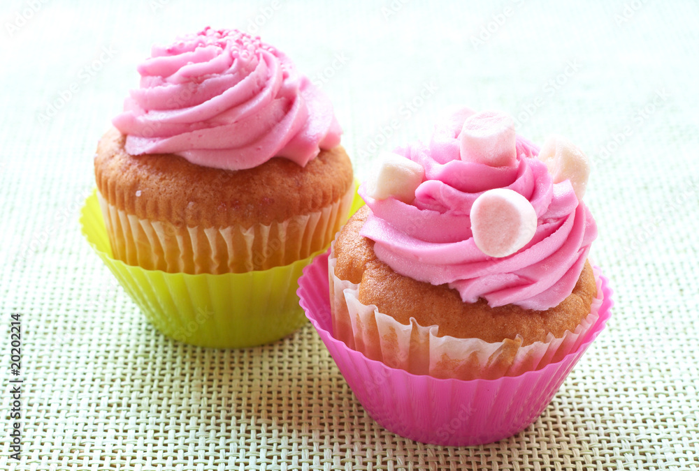 Vanilla cupcakes with strawberry icing Vanilla cupcakes with strawberry icing