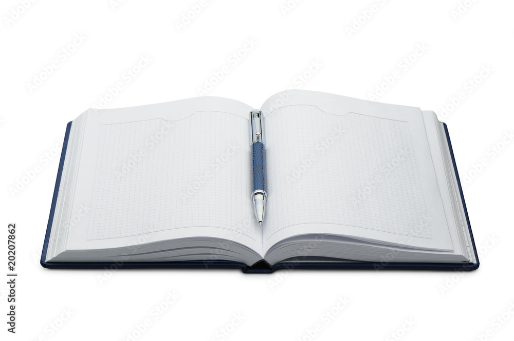 Pen above a notebook Pen above a notebook