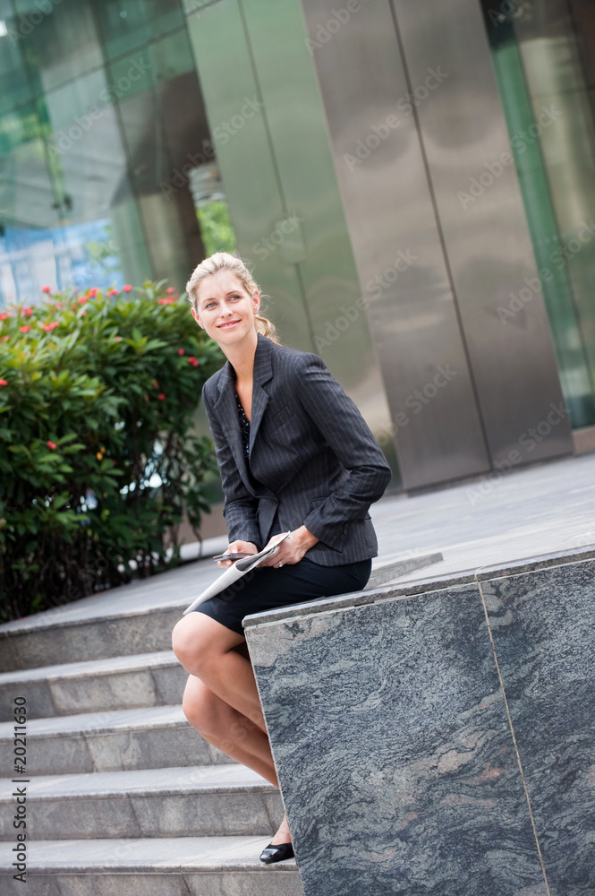 © EastWest Imaging - Businesswoman with Phone