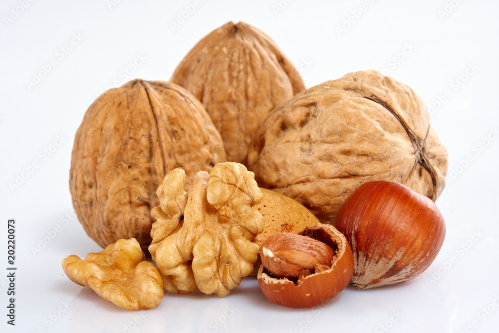 Assortment of nuts displayed on white background Assortment of nuts displayed on white background