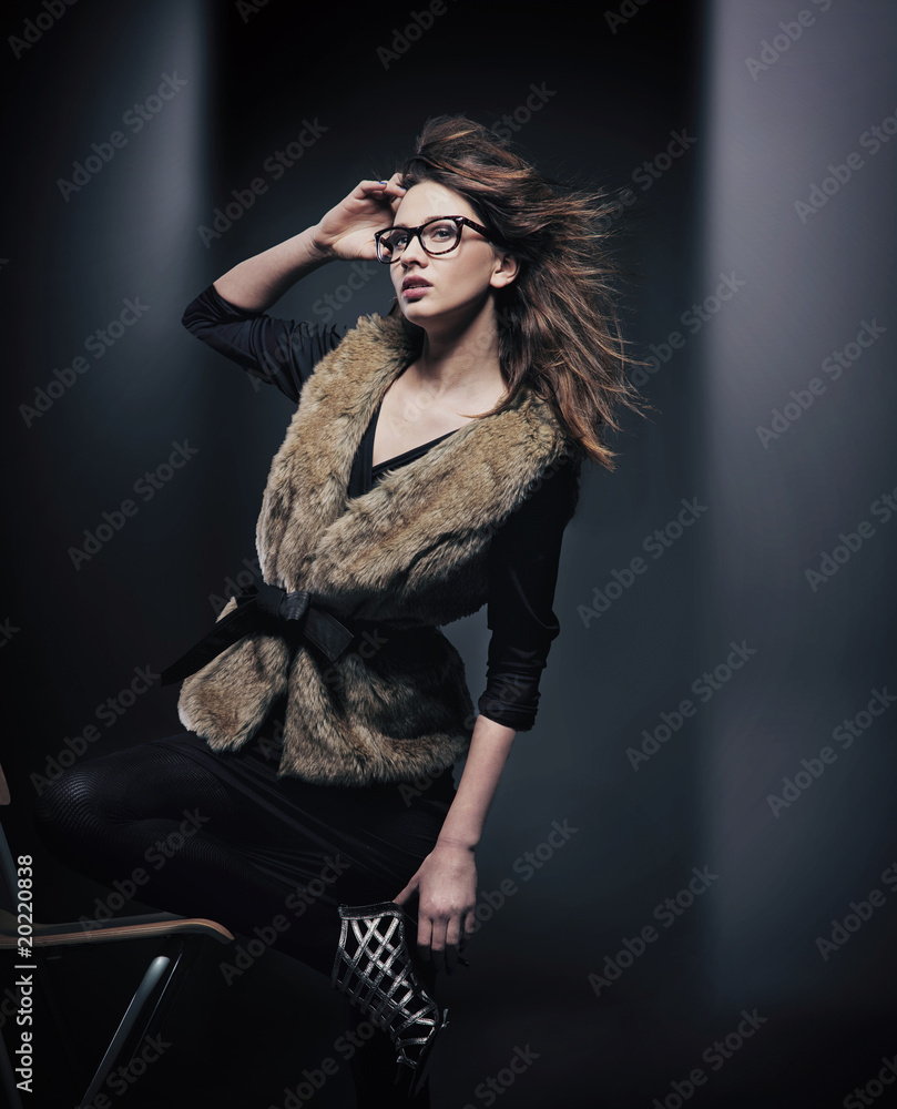 Fashion style photo of an elegant brunette posing Fashion style photo of an elegant brunette posing